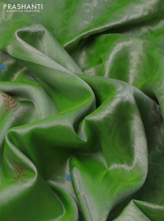 Pure uppada silk saree pista green with silver zari woven floral buttas and silver zari woven border