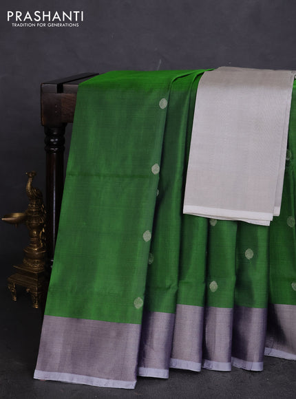 Pure uppada silk saree green with silver zari woven buttas and silver zari woven border
