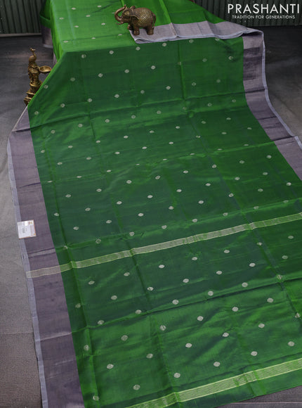 Pure uppada silk saree green with silver zari woven buttas and silver zari woven border