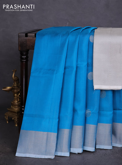 Pure uppada silk saree cs blue with silver zari woven coin buttas and silver zari woven border