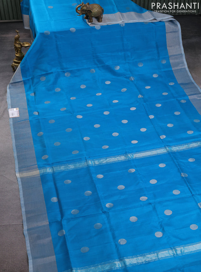 Pure uppada silk saree cs blue with silver zari woven coin buttas and silver zari woven border