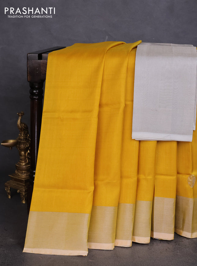 Pure uppada silk saree yellow with silver zari woven coin buttas and silver zari woven border