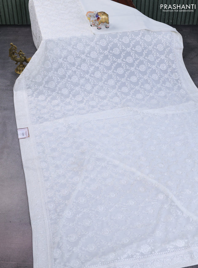 Semi georgette saree off white with allover chikankari & stone work