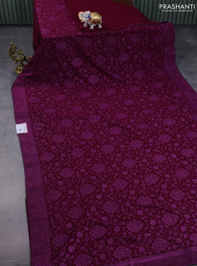 Semi georgette saree wine shade with allover chikankari & stone work