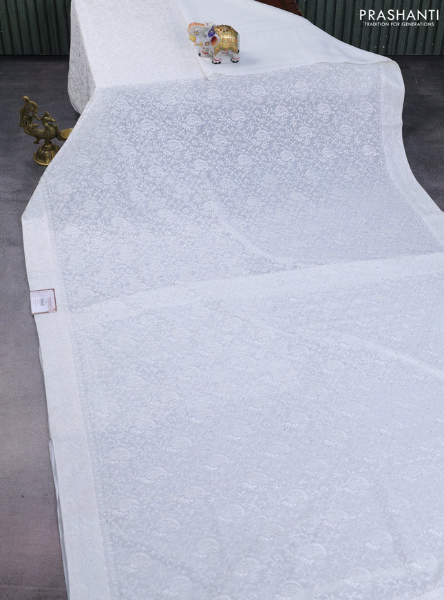 Semi georgette saree off white with allover chikankari & stone work