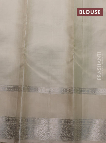 Pure soft silk saree teal green shade and beige with allover checked pattern and rettapet silver zari woven border