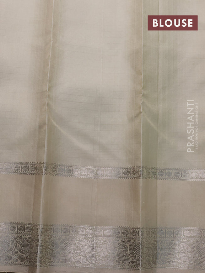 Pure soft silk saree teal green shade and beige with allover checked pattern and rettapet silver zari woven border