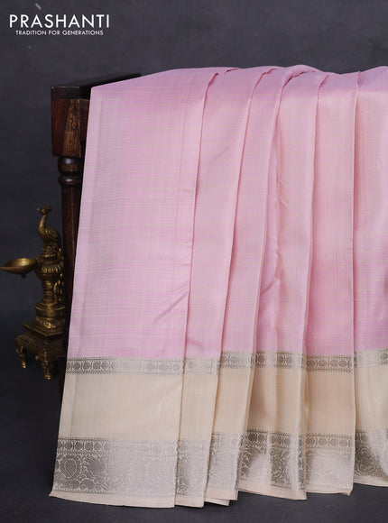 Pure soft silk saree baby pink and cream with allover checked pattern and rettapet silver zari woven border
