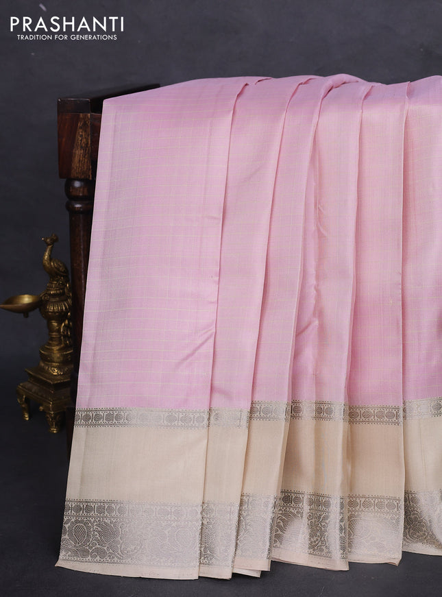 Pure soft silk saree baby pink and cream with allover checked pattern and rettapet silver zari woven border