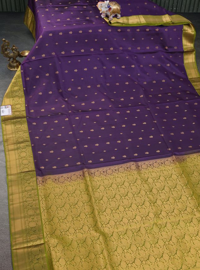 Pure soft silk saree deep purple and light blue with allover zari woven buttas and zari woven border