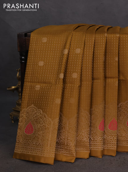 Pure soft silk saree mehendi green with allover zari woven butta weaves and zari woven border