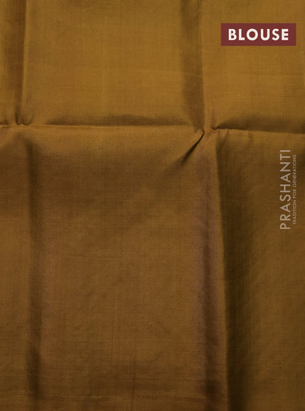 Pure soft silk saree mehendi green with allover zari woven butta weaves and zari woven border