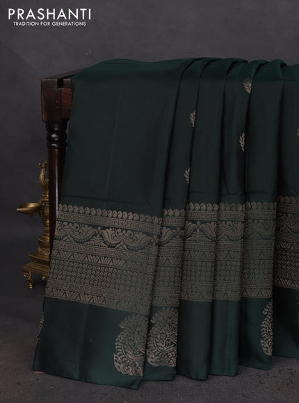 Pure soft silk saree bottle green with zari woven buttas and zari woven border