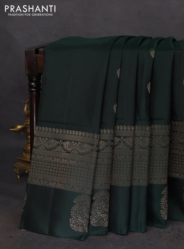 Pure soft silk saree bottle green with zari woven buttas and zari woven border