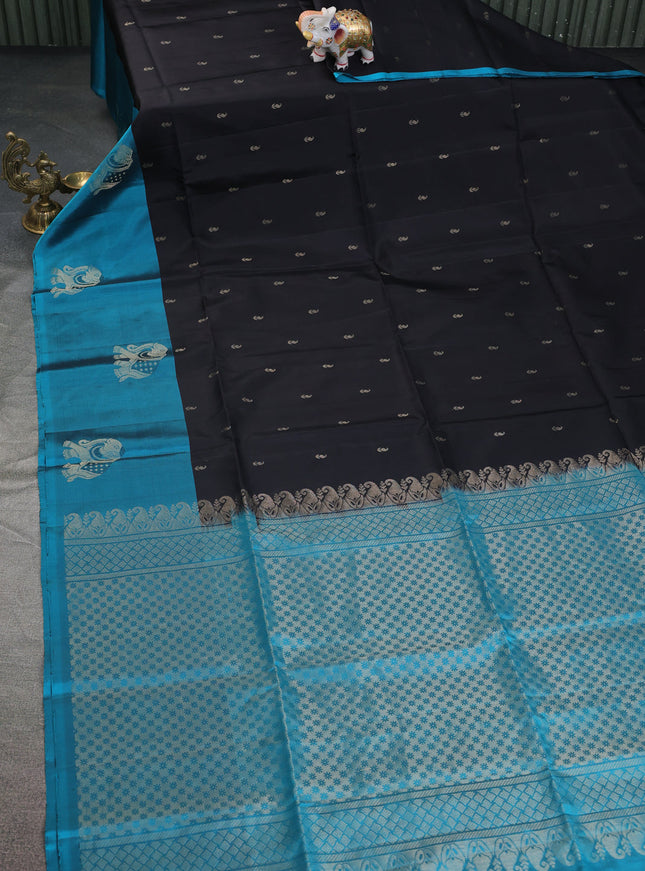 Pure soft silk saree black and teal blue with zari woven paisley buttas and elephnat design zari woven butta border