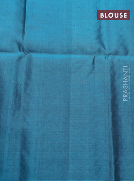 Pure soft silk saree black and teal blue with zari woven paisley buttas and elephnat design zari woven butta border