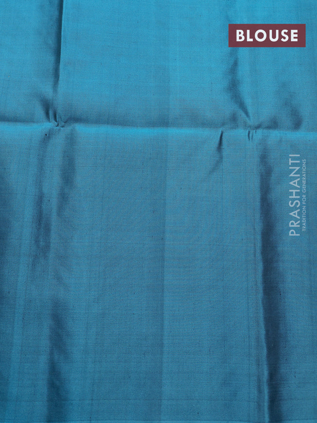 Pure soft silk saree black and teal blue with zari woven paisley buttas and elephnat design zari woven butta border