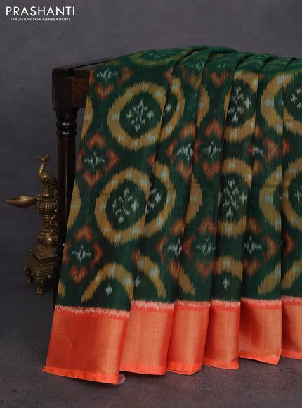 Ikat silk cotton saree dark green and orange with allover ikat weaves and zari woven border