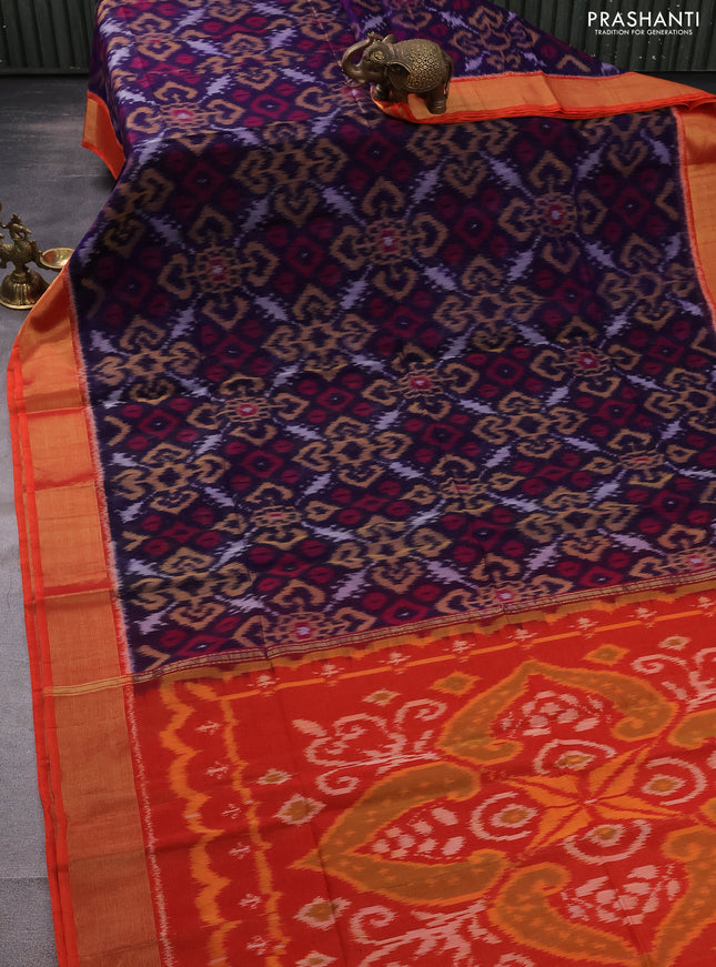 Ikat silk cotton saree dark blue and reddish orange with allover ikat weaves and zari woven border