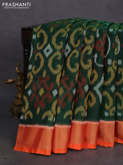 Ikat silk cotton saree green and reddish orange with allover ikat weaves and zari woven border