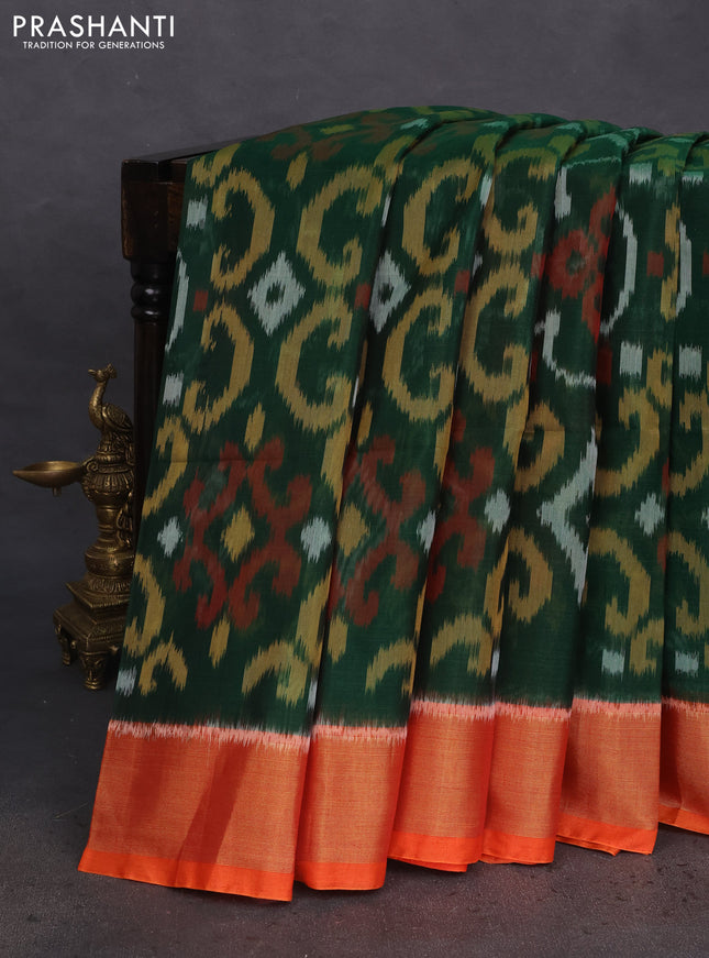 Ikat silk cotton saree green and reddish orange with allover ikat weaves and zari woven border