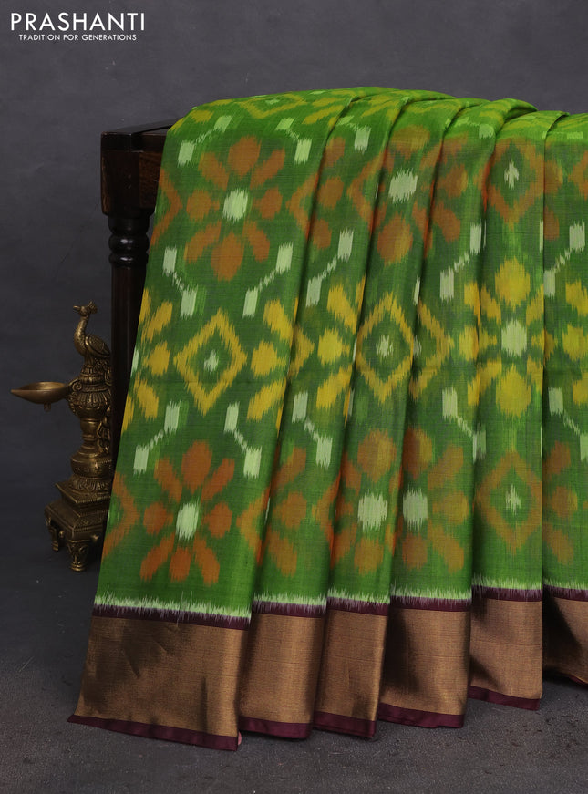 Ikat silk cotton saree green and wine shade with allover ikat weaves and zari woven border