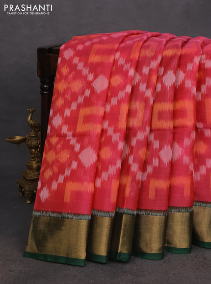 Ikat silk cotton saree pink and green with allover ikat weaves and zari woven border