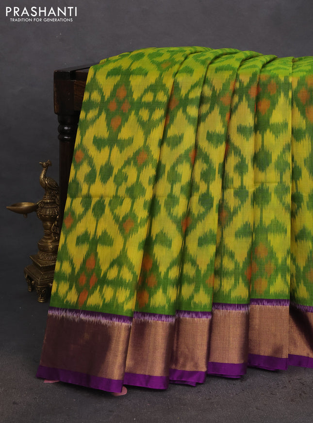 Ikat silk cotton saree light green and purple with allover ikat weaves and zari woven border