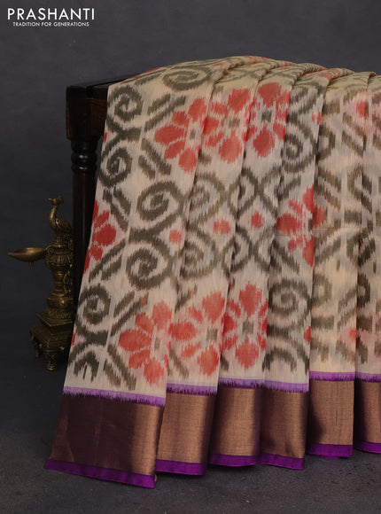 Ikat silk cotton saree beige and cs blue with allover ikat weaves and zari woven border