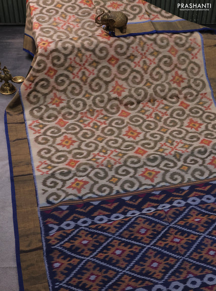 Ikat silk cotton saree beige and cs blue with allover ikat weaves and zari woven border