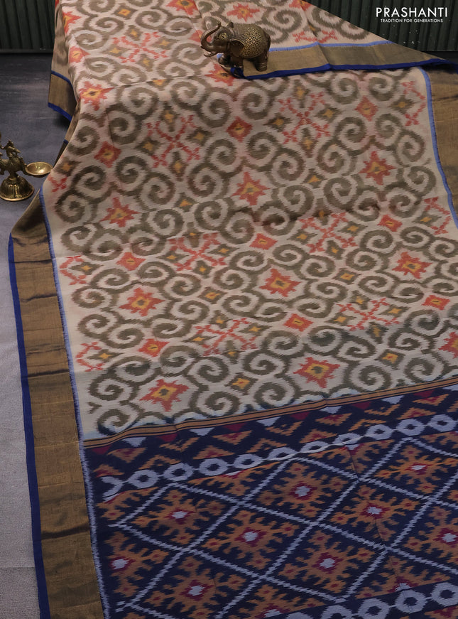 Ikat silk cotton saree beige and cs blue with allover ikat weaves and zari woven border