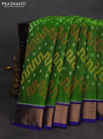 Ikat silk cotton saree light green and blue with allover ikat weaves and zari woven border