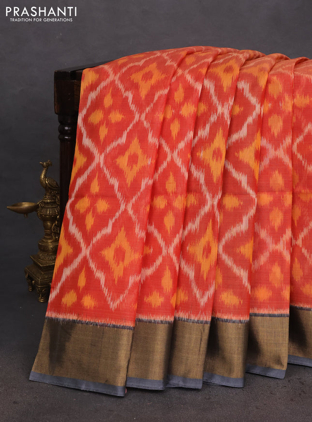 Ikat silk cotton saree orange and grey with allover ikat weaves and zari woven border
