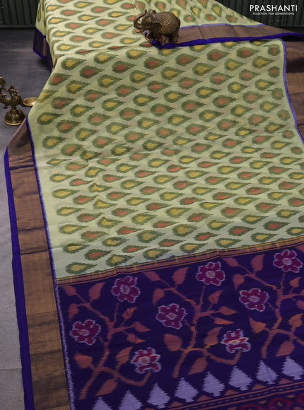 Ikat silk cotton saree pista green and blue with allover ikat weaves and zari woven border