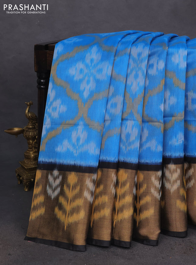 Ikat silk cotton saree blue and black with allover ikat weaves and long ikat woven zari border