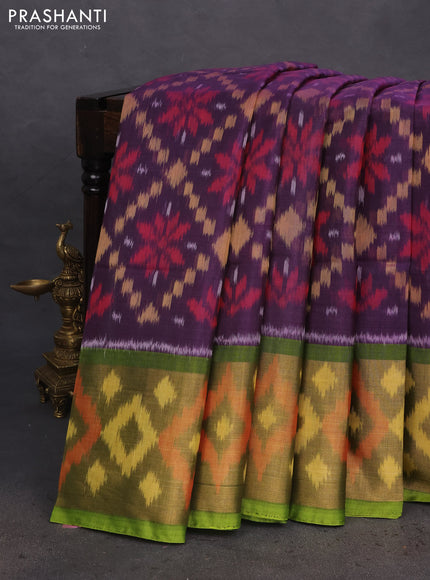 Ikat silk cotton saree deep violet and mehendi green with allover ikat weaves and long ikat woven zari border