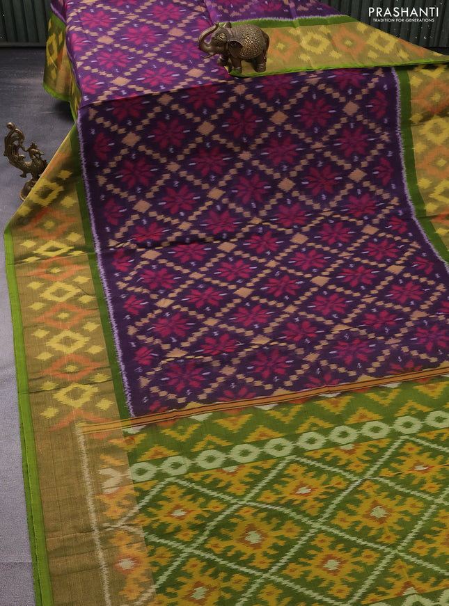 Ikat silk cotton saree deep violet and mehendi green with allover ikat weaves and long ikat woven zari border