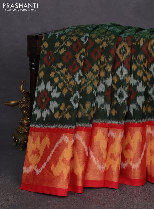 Ikat silk cotton saree bottle green and red with allover ikat weaves and long ikat woven zari border