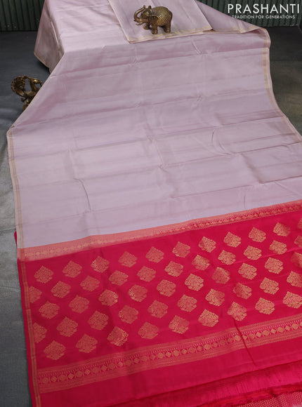 Pure kanchipuram silk saree beige and pink with plain body and small zari woven border