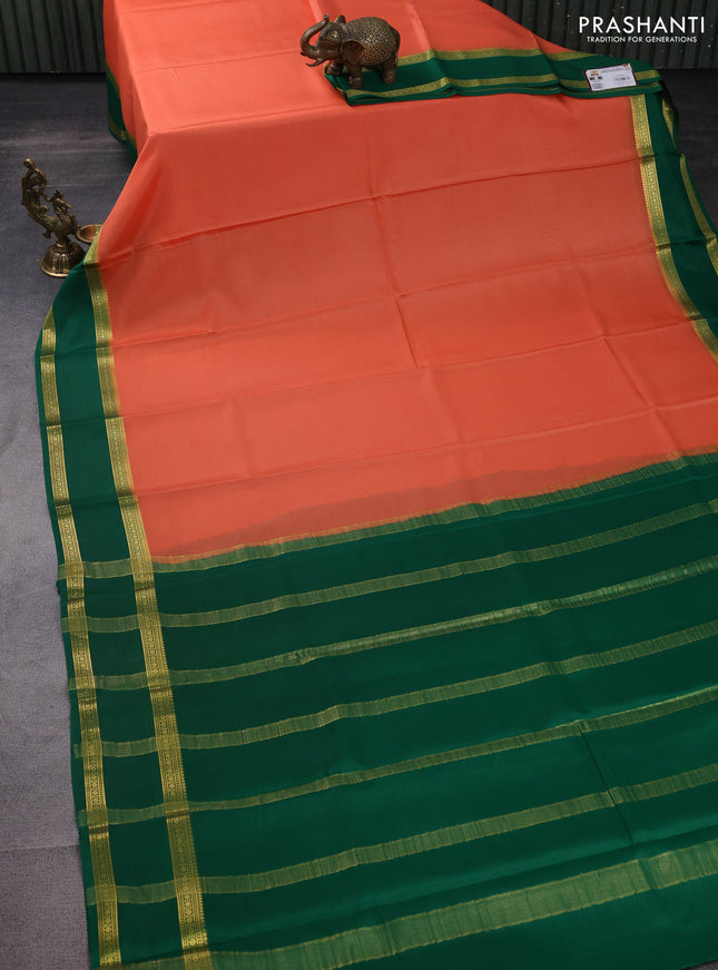 Pure mysore silk saree orange and green with plain body and rettapet zari woven border