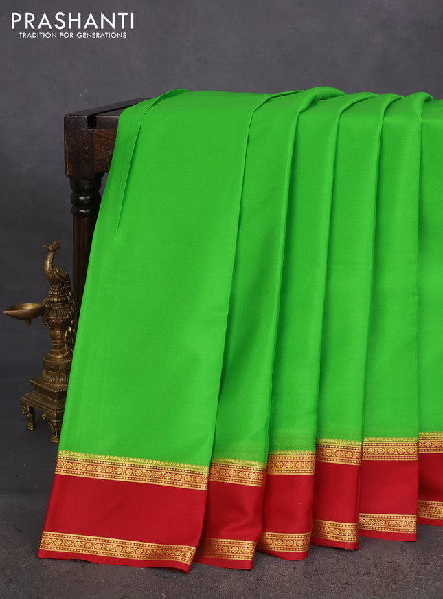 Pure mysore silk saree light green and red with plain body and rettapet zari woven border