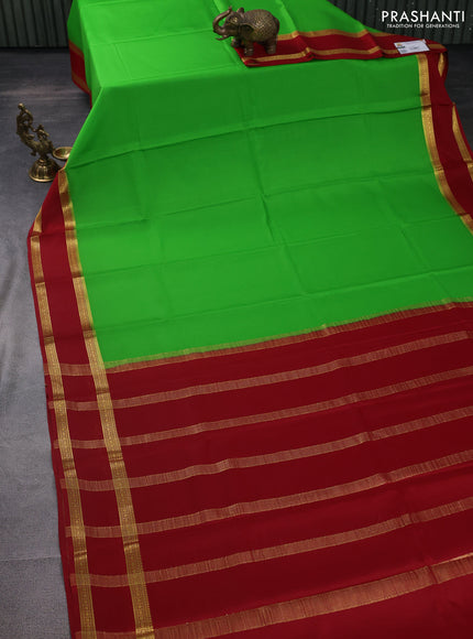 Pure mysore silk saree light green and red with plain body and rettapet zari woven border