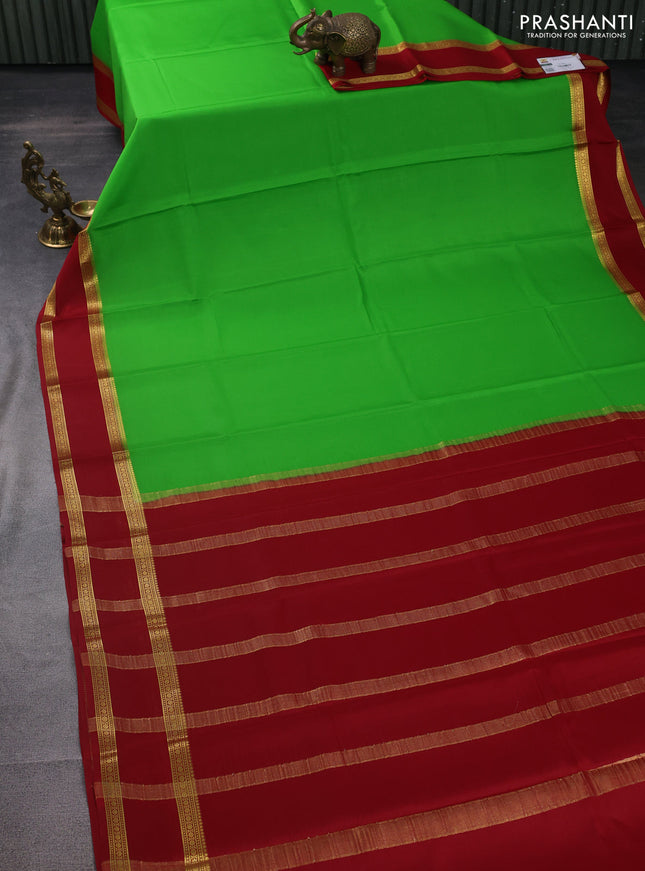 Pure mysore silk saree light green and red with plain body and rettapet zari woven border