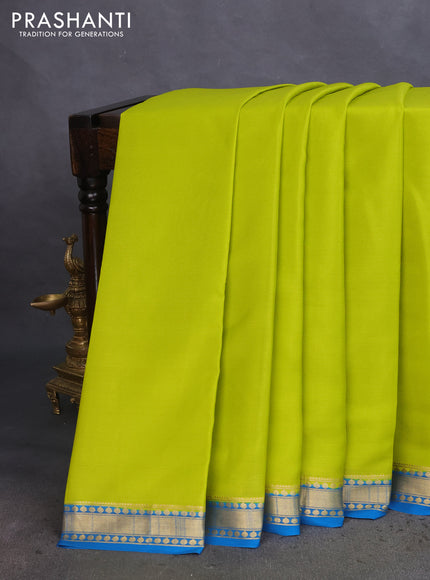 Pure mysore silk saree lime green and cs blue with plain body and zari woven border