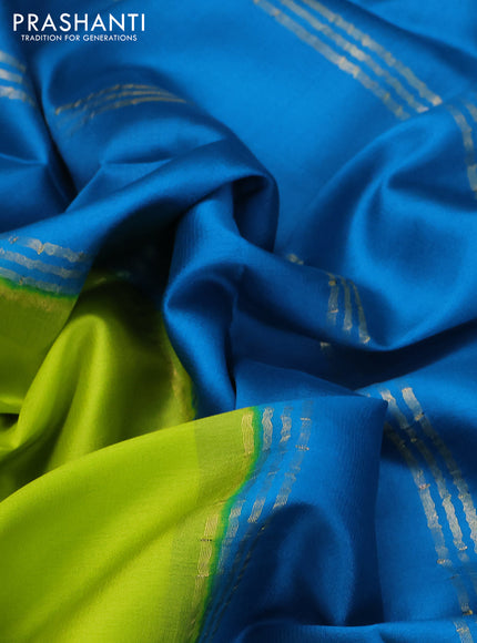 Pure mysore silk saree lime green and cs blue with plain body and zari woven border