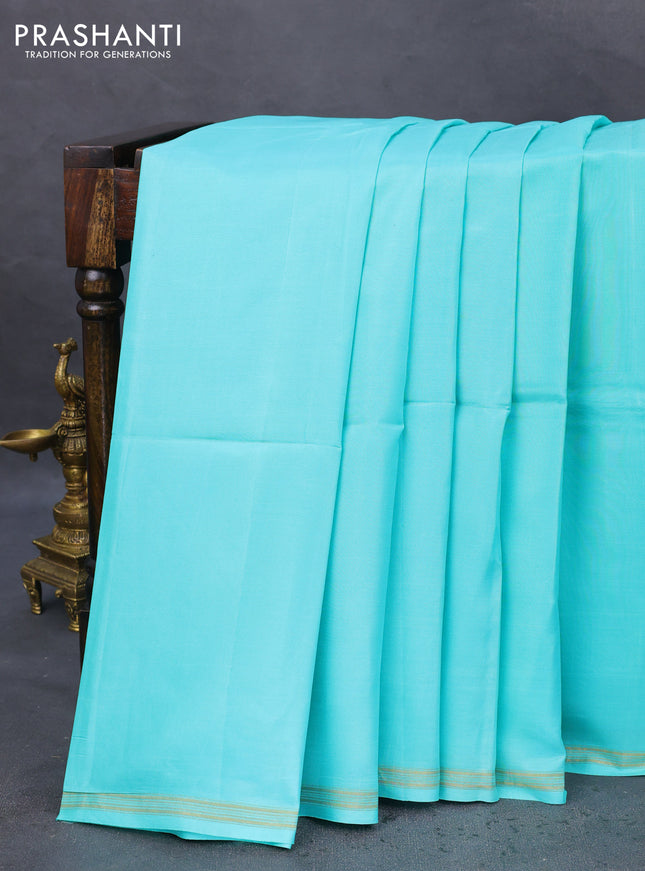 Pure soft silk saree teal blue and light blue with plain body and hand painted kalamkari printed pallu