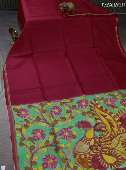 Pure soft silk saree reddish pink and pastel green with plain body and hand painted kalamkari printed pallu