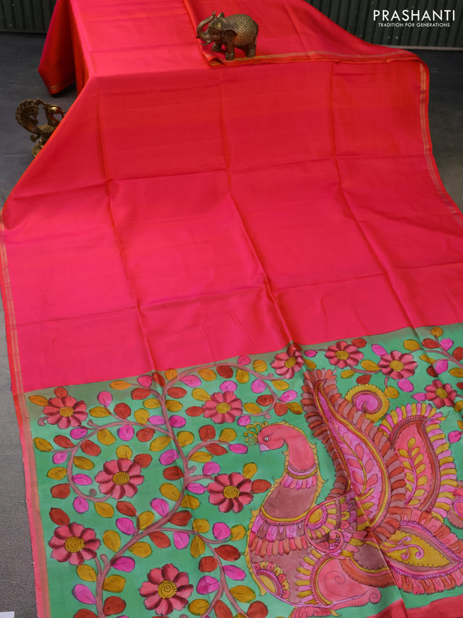 Pure soft silk saree dual shade of pinkish orange and pastel green with plain body and hand painted kalamkari printed pallu