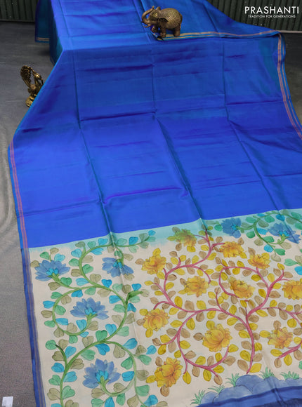 Pure soft silk saree dual shade of bluish green and cream with plain body and hand painted kalamkari printed pallu