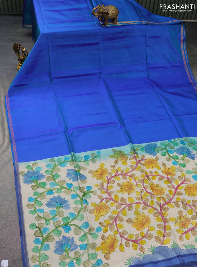 Pure soft silk saree dual shade of bluish green and cream with plain body and hand painted kalamkari printed pallu